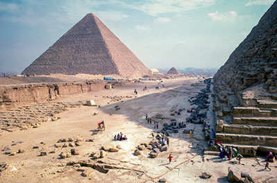 Tourists enjoying the sight of the Great Pyramids of Giza, Egypt
