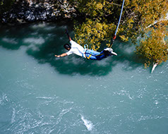 A tourist durinig a bungee jumping session in Africa