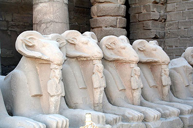 Lion figurehead statues lie in the Karnak Temple