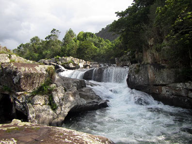 An image of Nyamuziwa Falls, a tourist attraction at Nynaga National Park, Zimbabwe