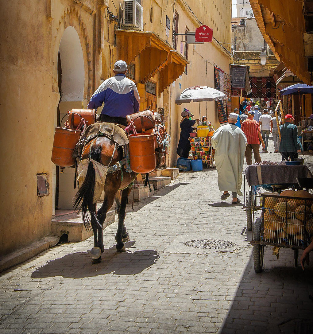 a view through the narrow architectual streets of morocco